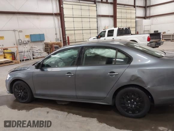 ✅ 2015 Volkswagen Jetta S • VIN: 3VW2K7AJ3FM317566 • Lot: 42990598. Listed on IAAI with 102,766 mi. Free auction sales archive from the USA and detailed vehicle history report at DreamBid. Image 14.