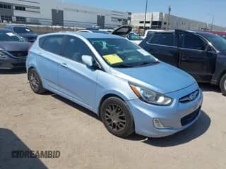 2013 Hyundai Accent SE with VIN KMHCU5AE0DU074716, listed as a IAAI auction lot 42951734 with 141,191 mi miles and . Bid and sale history available at DreamBid. Image 1.