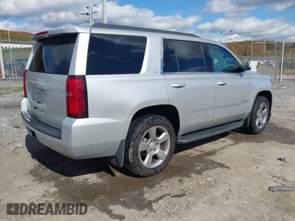 ✅ 2020 Chevrolet Tahoe LT • VIN: 1GNSKBKC4LR130084 • Lot: 43528817. Listed on IAAI with 71,583 mi. Free auction sales archive from the USA and detailed vehicle history report at DreamBid. Image 4.