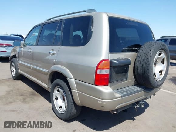 ✅ 2003 Suzuki XL7 Touring • VIN: JS3TX92V534103046 • Lot: 41978971. Listed on IAAI with 185,038 mi. Free auction sales archive from the USA and detailed vehicle history report at DreamBid. Image 3.