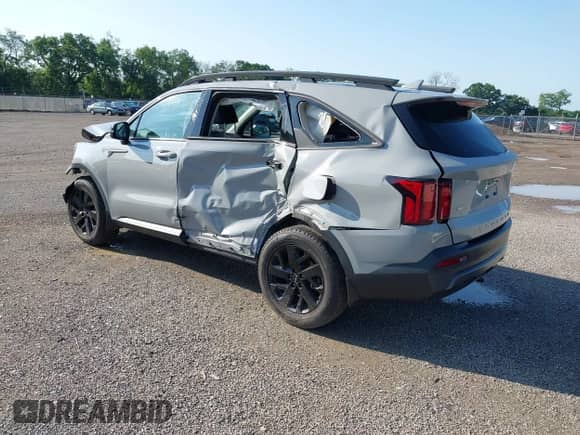 2022 Kia Sorento X-Line S z VIN 5XYRLDLC7NG144870, wystawiony jako IAAI lot #42557861 z przebiegiem 41 812 mil mil oraz . Historia ofert i sprzedaży dostępna na DreamBid. Obrazek 3.