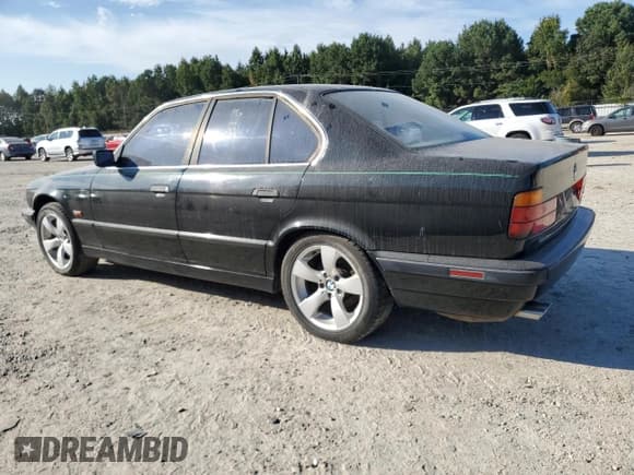 ✅ 1995 BMW 5 Series • VIN: WBAHE6323SGF30395 • Лот: 81578515. Опубликован ранее на Copart с пробегом Не указан. Бесплатный доступ к архиву аукционных продаж из США и подробный отчёт об истории автомобиля на DreamBid. Изображение 2.