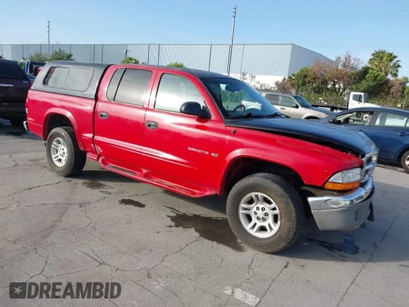 ✅ 2001 Dodge Dakota Sport • VIN: 1B7GG2AN51S148828 • Lot: 42095653. Wystawiony na IAAI z przebiegiem 232 995 mil. Bezpłatny archiwum sprzedaży aukcyjnych z USA i szczegółowy raport historii pojazdu na DreamBid. Zdjęcie 1.