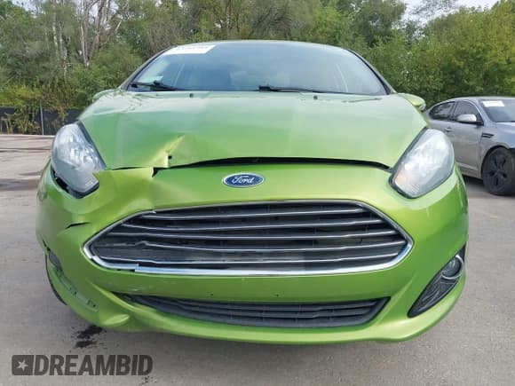 ✅ 2018 Ford Fiesta Titanium • VIN: 3FADP4CJ9JM117668 • Lot: 43281962. Listed on IAAI with 104,716 mi. Free auction sales archive from the USA and detailed vehicle history report at DreamBid. Image 6.