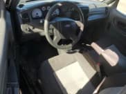 ✅ 2004 Ford Ranger XL • VIN: 1FTYR10UX4PB25702 • Lot: 82563365. Wystawiony na Copart z przebiegiem 149 441 mil. Bezpłatny archiwum sprzedaży aukcyjnych z USA i szczegółowy raport historii pojazdu na DreamBid. Zdjęcie 8.