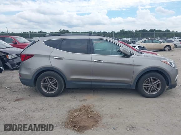 ✅ 2018 Hyundai Santa Fe 2.4L • VIN: 5NMZU3LB4JH103370 • Лот: 43300617. Опубликован ранее на IAAI с пробегом 139 580 миль. Бесплатный доступ к архиву аукционных продаж из США и подробный отчёт об истории автомобиля на DreamBid. Изображение 13.