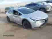 2025 Toyota Prius LE with VIN JTDACAAU4S3052719, listed as a IAAI auction lot 43175096 with 23,082 mi miles and . Bid and sale history available at DreamBid. Image 1.