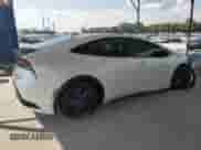 2025 Toyota Prius LE с VIN JTDACAAU5S3052468, выставлен на аукционе Copart как лот 81701345 с пробегом Не указан миль и Списание • Salvage title. История ставок и продаж доступна на DreamBid. Изображение 3.