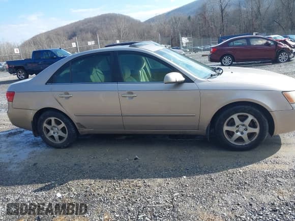 ✅ 2006 Hyundai Sonata GLS • VIN: 5NPEU46FX6H060523 • Лот: 41518409. Опубликован ранее на IAAI с пробегом 245 523 миль. Бесплатный доступ к архиву аукционных продаж из США и подробный отчёт об истории автомобиля на DreamBid. Изображение 13.