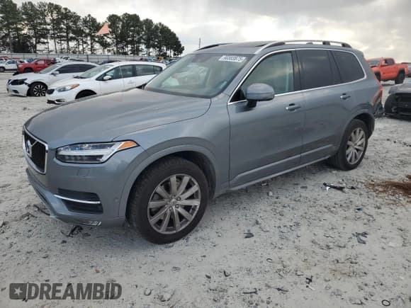 ✅ 2016 Volvo XC90 T6 Momentum • VIN: YV4A22PK3G1085547 • Lot: 90303875. Listed on Copart with 176,353 mi. Free auction sales archive from the USA and detailed vehicle history report at DreamBid. Image 1.