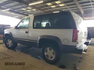 1996 Chevrolet Tahoe с VIN 3GNEK18R8TG153886, выставлен на аукционе Copart как лот 82260705 с пробегом 126 142 миль миль и Списание • Salvage title. История ставок и продаж доступна на DreamBid. Изображение 2.