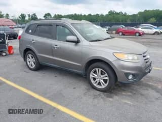 2012 Hyundai Santa Fe Limited with VIN 5XYZKDAG5CG095271, listed as a IAAI auction lot 42409813 with 154,757 mi miles and . Bid and sale history available at DreamBid. Image 1.