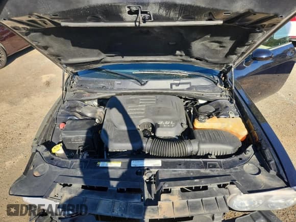 ✅ 2012 Dodge Challenger SXT Plus • VIN: 2C3CDYAG1CH148044 • Лот: 91060215. Опубликован ранее на Copart с пробегом 124 780 миль. Бесплатный доступ к архиву аукционных продаж из США и подробный отчёт об истории автомобиля на DreamBid. Изображение 11.