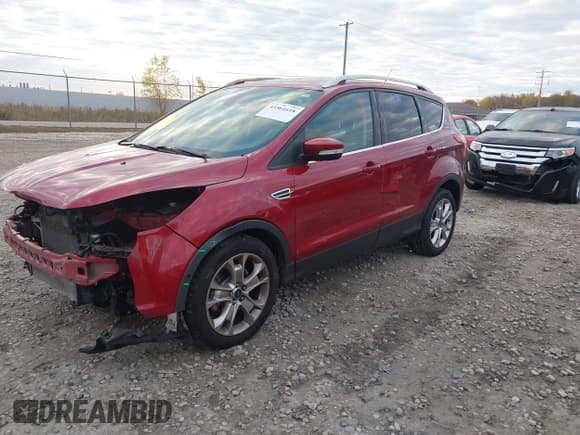 ✅ 2015 Ford Escape Titanium • VIN: 1FMCU9J90FUB74988 • Lot: 43561618. Listed on IAAI with 93,694 mi. Free auction sales archive from the USA and detailed vehicle history report at DreamBid. Image 2.