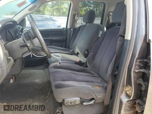 2004 Dodge 1500 SLT z VIN 1D7HA18N94J153875, wystawiony jako Copart lot #68169044 z przebiegiem 217 981 mil mil oraz Szkoda całkowita • Salvage title. Historia ofert i sprzedaży dostępna na DreamBid. Obrazek 7.