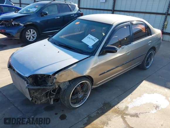 ✅ 2002 Honda Civic LX • VIN: 1HGES16502L020695 • Lot: 43629504. Listed on IAAI with 191,312 mi. Free auction sales archive from the USA and detailed vehicle history report at DreamBid. Image 23.