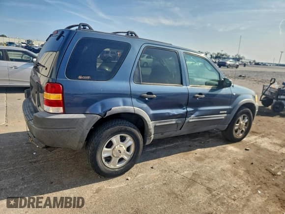 ✅ 2001 Ford Escape XLT • VIN: 1FMYU03121KC39322 • Lot: 94912905. Listed on Copart with 211,075 mi. Free auction sales archive from the USA and detailed vehicle history report at DreamBid. Image 3.