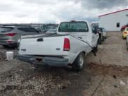 ✅ 1999 Ford F-250 XL • VIN: 1FTNF20L7XEA00374 • Lot: 42210425. Listed on IAAI with 73,885 mi. Free auction sales archive from the USA and detailed vehicle history report at DreamBid. Image 4.