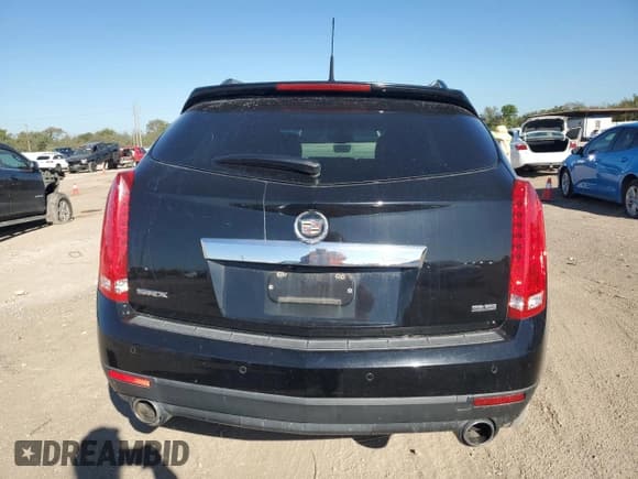 ✅ 2013 Cadillac SRX Luxury Collection • VIN: 3GYFNCE39DS655606 • Лот: 87225095. Опубликован ранее на Copart с пробегом 92 044 миль. Бесплатный доступ к архиву аукционных продаж из США и подробный отчёт об истории автомобиля на DreamBid. Изображение 6.