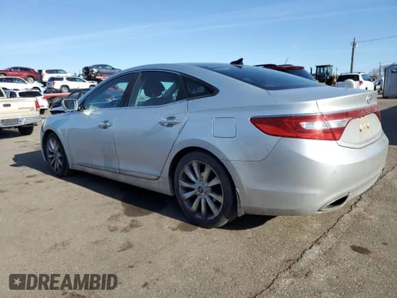 2012 Hyundai Azera с VIN KMHFH4JG8CA186371, выставлен на аукционе Copart как лот 48458795 с пробегом 154 782 миль миль и Списание • Salvage title. История ставок и продаж доступна на DreamBid. Изображение 2.