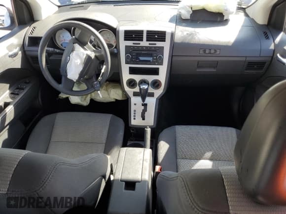 ✅ 2009 Dodge Caliber SXT • VIN: 1B3HB48A99D132084 • Лот: 76085644. Опубликован ранее на Copart с пробегом Не указан. Бесплатный доступ к архиву аукционных продаж из США и подробный отчёт об истории автомобиля на DreamBid. Изображение 8.