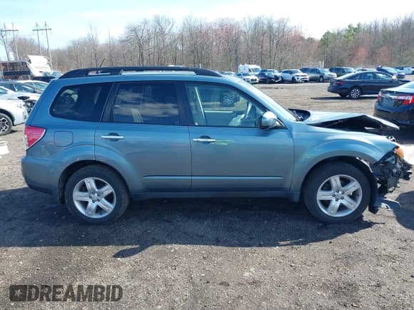 ✅ 2009 Subaru Forester X • VIN: JF2SH63669H718186 • Lot: 41869293. Listed on IAAI with 122,445 mi. Free auction sales archive from the USA and detailed vehicle history report at DreamBid. Image 13.