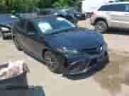 2021 Toyota Camry SE with VIN 4T1G11BK6MU036852, listed as a IAAI auction lot 42590115 with 79,752 mi miles and . Bid and sale history available at DreamBid. Image 1.