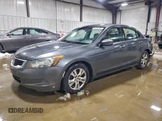 ✅ 2009 Honda Accord LX-P • VIN: 1HGCP26449A176590 • Lot: 94442785. Listed on Copart with 193,039 mi. Free auction sales archive from the USA and detailed vehicle history report at DreamBid. Image 1.