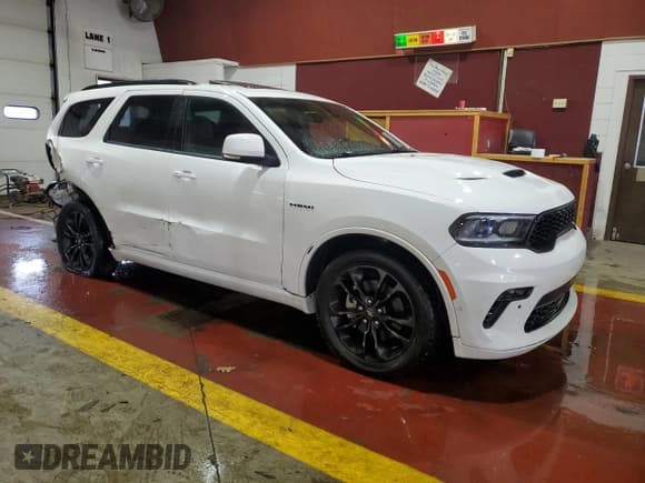 ✅ 2022 Dodge Durango Orange Sport • VIN: 1C4SDHCT3NC229103 • Lot: 60635075. Listed on Copart with 48,670 mi. Free auction sales archive from the USA and detailed vehicle history report at DreamBid. Image 4.
