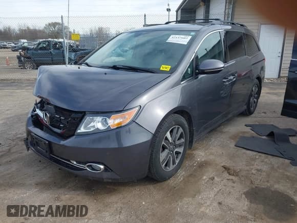 ✅ 2016 Honda Odyssey Touring Elite • VIN: 5FNRL5H99GB072860 • Lot: 42157603. Listed on IAAI with 221,449 mi. Free auction sales archive from the USA and detailed vehicle history report at DreamBid. Image 2.
