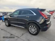 ✅ 2021 Cadillac XT4 FWD Premium Luxury • VIN: 1GYFZCR48MF083052 • Lot: 91090675. Wystawiony na Copart z przebiegiem 61 780 mil. Bezpłatny archiwum sprzedaży aukcyjnych z USA i szczegółowy raport historii pojazdu na DreamBid. Zdjęcie 2.