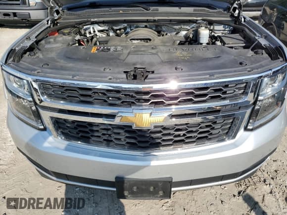 ✅ 2018 Chevrolet Suburban LT • VIN: 1GNSKHKC2JR153718 • Lot: 71467944. Listed on Copart with 73,272 mi. Free auction sales archive from the USA and detailed vehicle history report at DreamBid. Image 12.