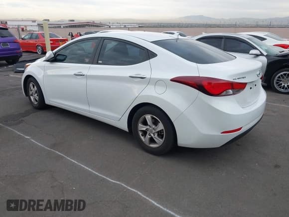 ✅ 2015 Hyundai Elantra SE • VIN: 5NPDH4AE4FH590128 • Lot: 43692893. Listed on IAAI with 81,836 mi. Free auction sales archive from the USA and detailed vehicle history report at DreamBid. Image 3.