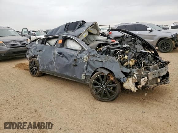 ✅ 2022 Mazda 3 Carbon Edition • VIN: JM1BPACL7N1509181 • Lot: 84629225. Listed on Copart with Not provided. Free auction sales archive from the USA and detailed vehicle history report at DreamBid. Image 4.