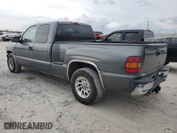 2002 Chevrolet Silverado 1500 LS z VIN 2GCEC19T921344756, wystawiony jako Copart lot #72798354 z przebiegiem 157 700 mil mil oraz Szkoda całkowita • Salvage title. Historia ofert i sprzedaży dostępna na DreamBid. Obrazek 2.