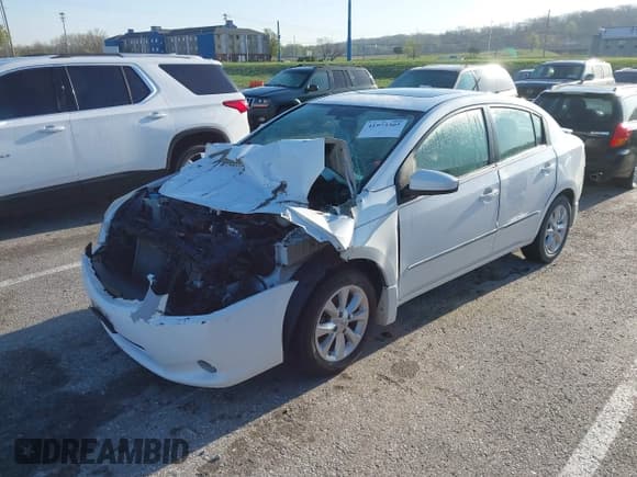 ✅ 2012 Nissan Sentra S • VIN: 3N1AB6AP2CL708502 • Лот: 41973305. Опубликован ранее на IAAI с пробегом Не указан. Бесплатный доступ к архиву аукционных продаж из США и подробный отчёт об истории автомобиля на DreamBid. Изображение 2.