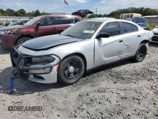 2019 Dodge Charger Police с VIN 2C3CDXAT6KH579890, выставлен на аукционе Copart как лот 85170295 с пробегом 130 334 миль миль и Чистый • Clean title. История ставок и продаж доступна на DreamBid. Изображение 1.