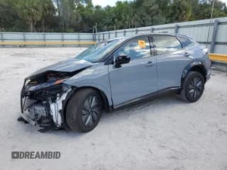 ✅ 2023 Nissan ARIYA Engage • VIN: JN1CF0BB8PM702857 • Лот: 52911584. Опубликован ранее на Copart с пробегом 611 миль. Бесплатный доступ к архиву аукционных продаж из США и подробный отчёт об истории автомобиля на DreamBid. Изображение 1.