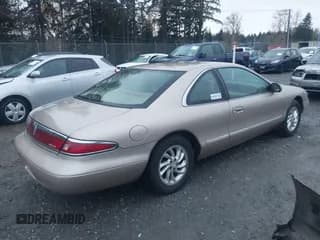 ✅ 1997 Lincoln Mark VIII • VIN: 1LNLM91V0VY678185 • Lot: 43698865. Listed on IAAI with 140,782 mi. Free auction sales archive from the USA and detailed vehicle history report at DreamBid. Image 4.