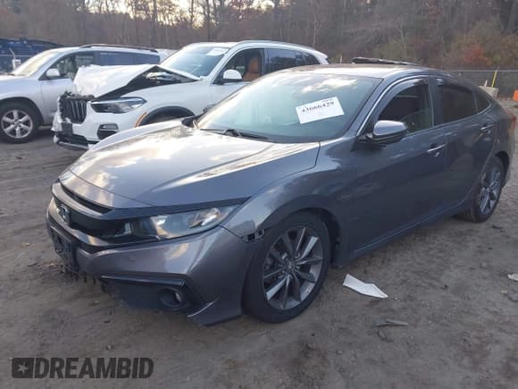 ✅ 2020 Honda Civic Sport • VIN: 19XFC2E82LE025263 • Lot: 43666429. Wystawiony na IAAI z przebiegiem 62 003 mil. Bezpłatny archiwum sprzedaży aukcyjnych z USA i szczegółowy raport historii pojazdu na DreamBid. Zdjęcie 2.