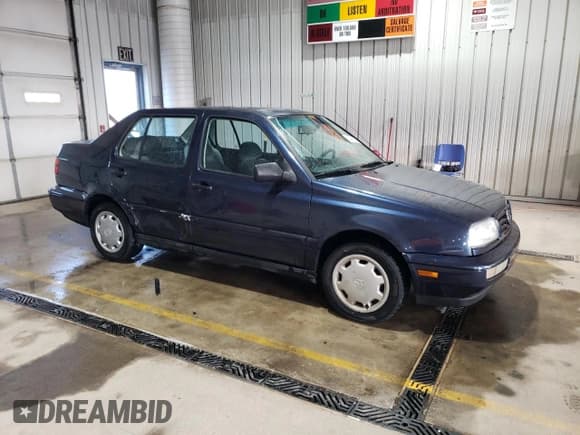 ✅ 1997 Volkswagen Jetta GL • VIN: 3VWRA81H3VM102787 • Lot: 50499765. Listed on Copart with 181,184 mi. Free auction sales archive from the USA and detailed vehicle history report at DreamBid. Image 4.