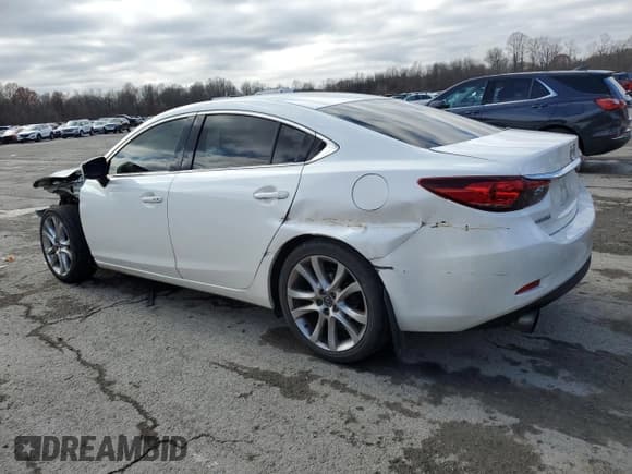 ✅ 2017 Mazda 6 Touring • VIN: JM1GL1V54H1110992 • Лот: 93571585. Опубликован ранее на Copart с пробегом 161 401 миль. Бесплатный доступ к архиву аукционных продаж из США и подробный отчёт об истории автомобиля на DreamBid. Изображение 2.