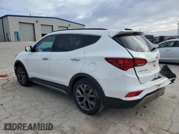 ✅ 2017 Hyundai Santa Fe Ultimate • VIN: 5XYZW4LAXHG495685 • Лот: 82484263. Опубликован ранее на Copart с пробегом 99 589 миль. Бесплатный доступ к архиву аукционных продаж из США и подробный отчёт об истории автомобиля на DreamBid. Изображение 2.