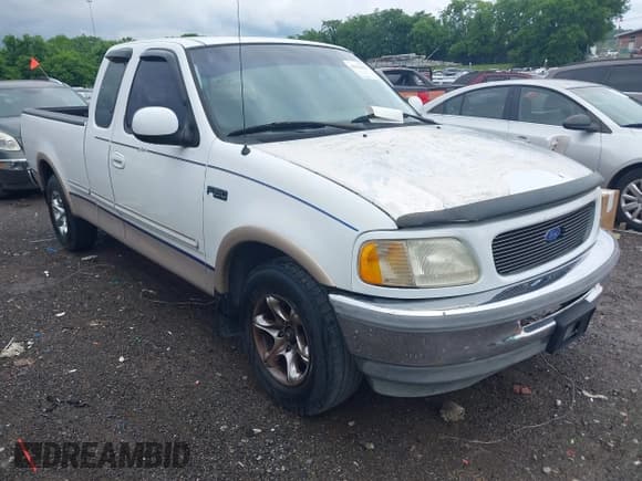 ✅ 1997 Ford F-150 XL • VIN: 1FTEX17L1VNB15658 • Lot: 42353422. Wystawiony na IAAI z przebiegiem 217 975 mil. Bezpłatny archiwum sprzedaży aukcyjnych z USA i szczegółowy raport historii pojazdu na DreamBid. Zdjęcie 1.