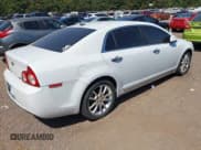 ✅ 2010 Chevrolet Malibu LTZ 1LZ • VIN: 1G1ZE5E06A4128311 • Lot: 43159174. Listed on IAAI with 131,771 mi. Free auction sales archive from the USA and detailed vehicle history report at DreamBid. Image 4.