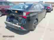 2021 Toyota Prius L Eco with VIN JTDKAMFU0M3138018, listed as a IAAI auction lot 43009082 with 153,830 mi miles and . Bid and sale history available at DreamBid. Image 4.