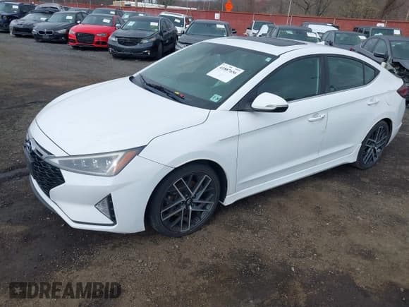 ✅ 2019 Hyundai Elantra Sport • VIN: KMHD04LB3KU841923 • Lot: 41887656. Listed on IAAI with 64,454 mi. Free auction sales archive from the USA and detailed vehicle history report at DreamBid. Image 18.