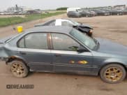 ✅ 1997 Honda Civic DX • VIN: 2HGEJ6525VH586800 • Lot: 42388090. Listed on IAAI with 255,879 mi. Free auction sales archive from the USA and detailed vehicle history report at DreamBid. Image 14.