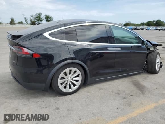 ✅ 2017 Tesla Model X 90D • VIN: 5YJXCBE23HF046107 • Lot: 45207813. Listed on Copart with 78,754 mi. Free auction sales archive from the USA and detailed vehicle history report at DreamBid. Image 3.