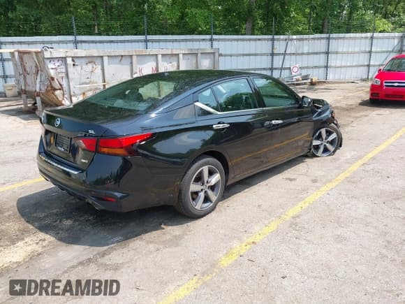 ✅ 2021 Nissan Altima SL • VIN: 1N4BL4EW9MN340105 • Lot: 42431637. Listed on IAAI with 74,695 mi. Free auction sales archive from the USA and detailed vehicle history report at DreamBid. Image 4.
